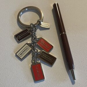 Coach Silver and Red Tag Keychain and Coach Pen